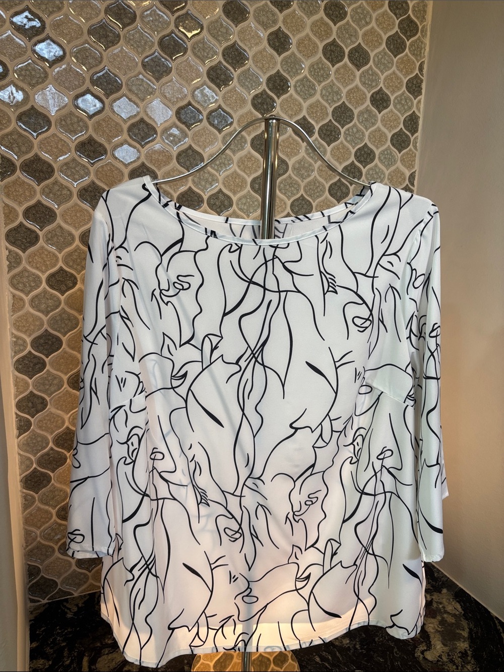 Elegant White Blouse with Black Abstract Line Print